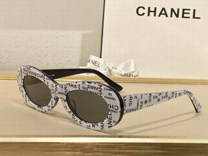 CHNL “The News’Print” Oval sunglasses